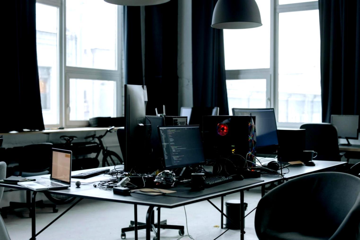 Professional blockchain data monitoring workspace with multiple screens displaying real-time analytics and transaction flows